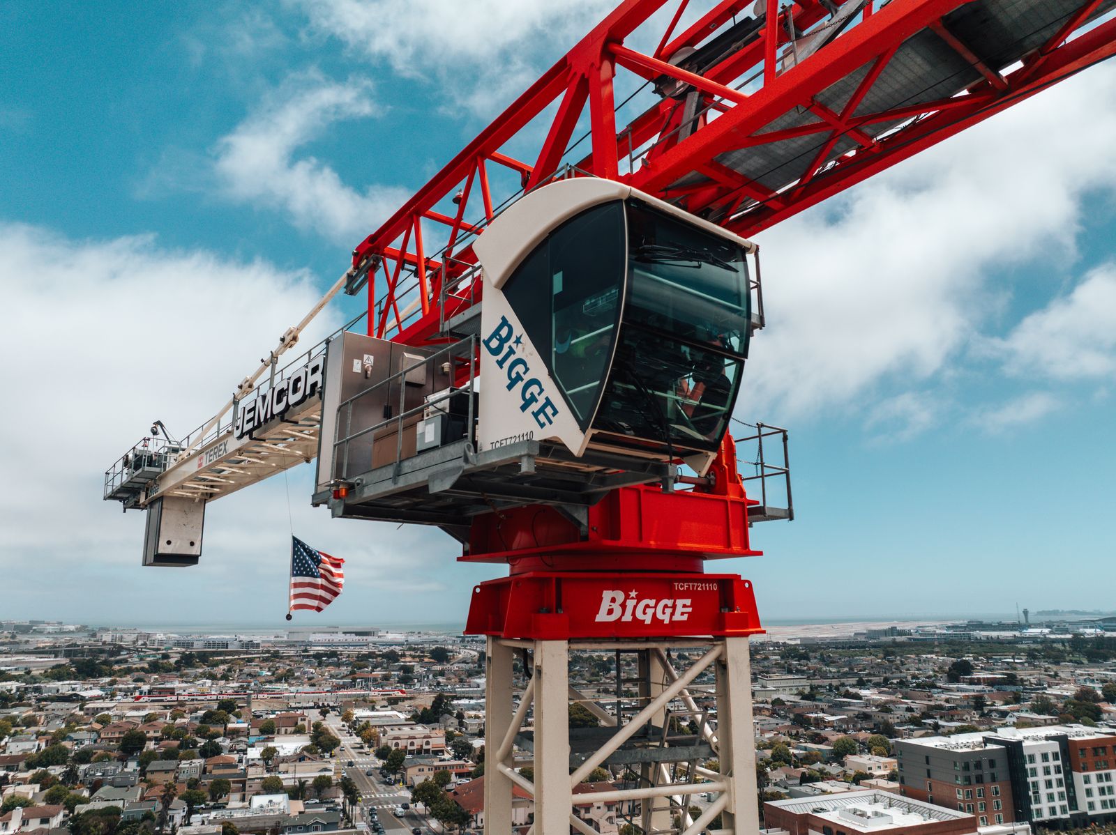 Tower crane operator cab with American flag — 840 San Bruno Ave