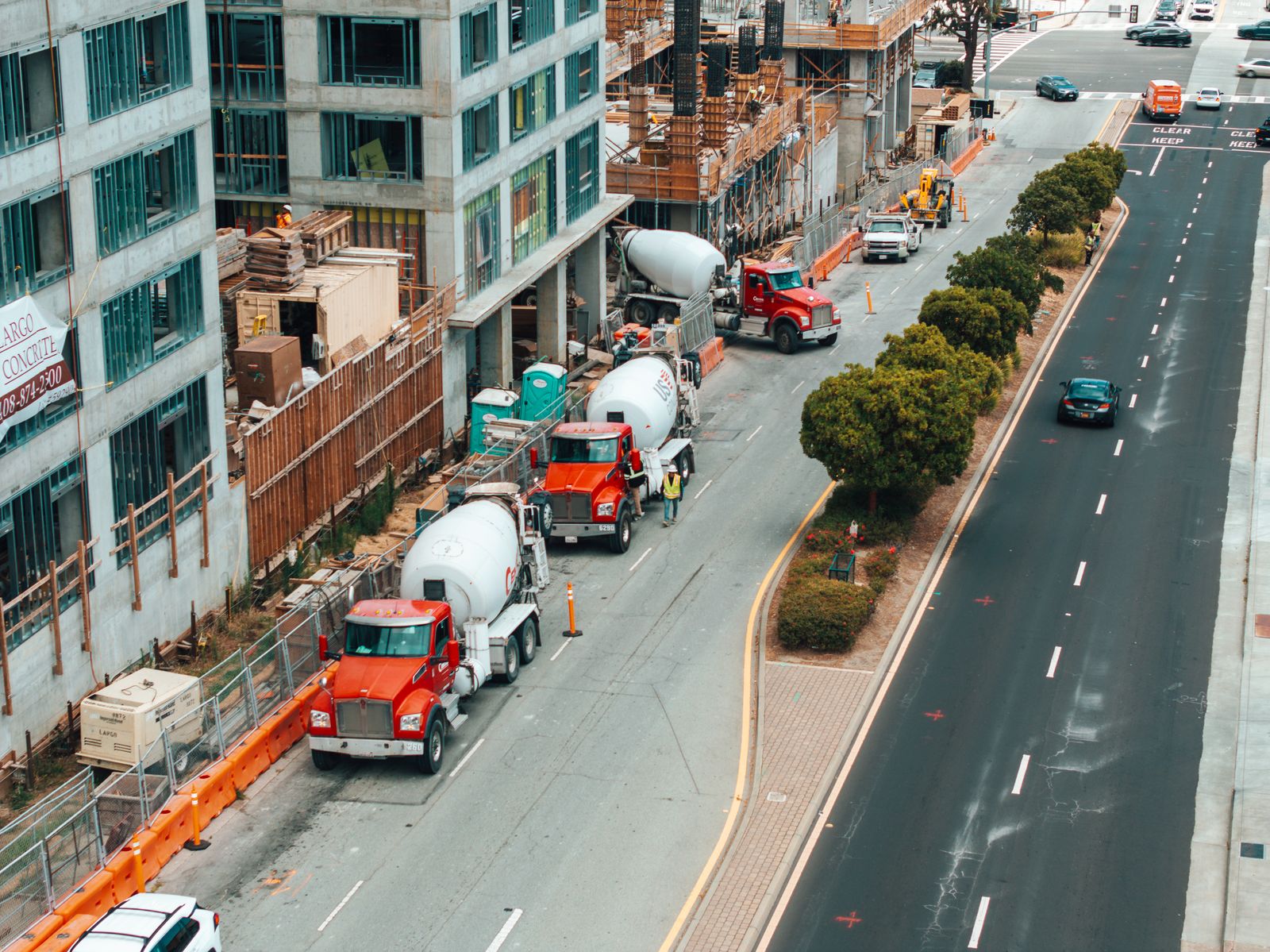 Concrete mixer convoy on site — 840 San Bruno Ave